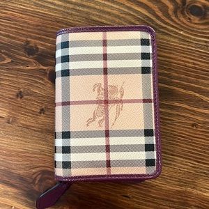 Authentic Burberry wallet. Used a few times but in great condition.